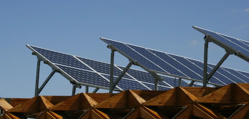 Several large solar panel arrays angled towards the sun for maximum power generation.